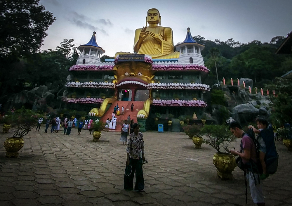Buddha at the Base of the Dambulla Cave Temple