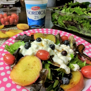 Grilled fresh fruit salad with cottage cheese and balsamic vinegar