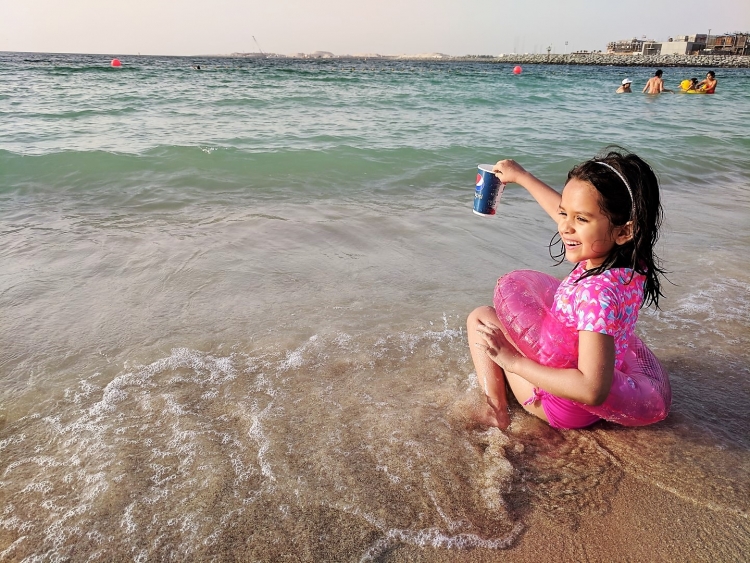 Dubai beach with kids. Bikinis Dubai