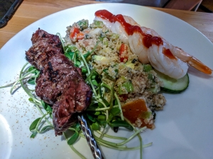 Fiddleheads Beef Brochette with couscous and shrimp cocktail