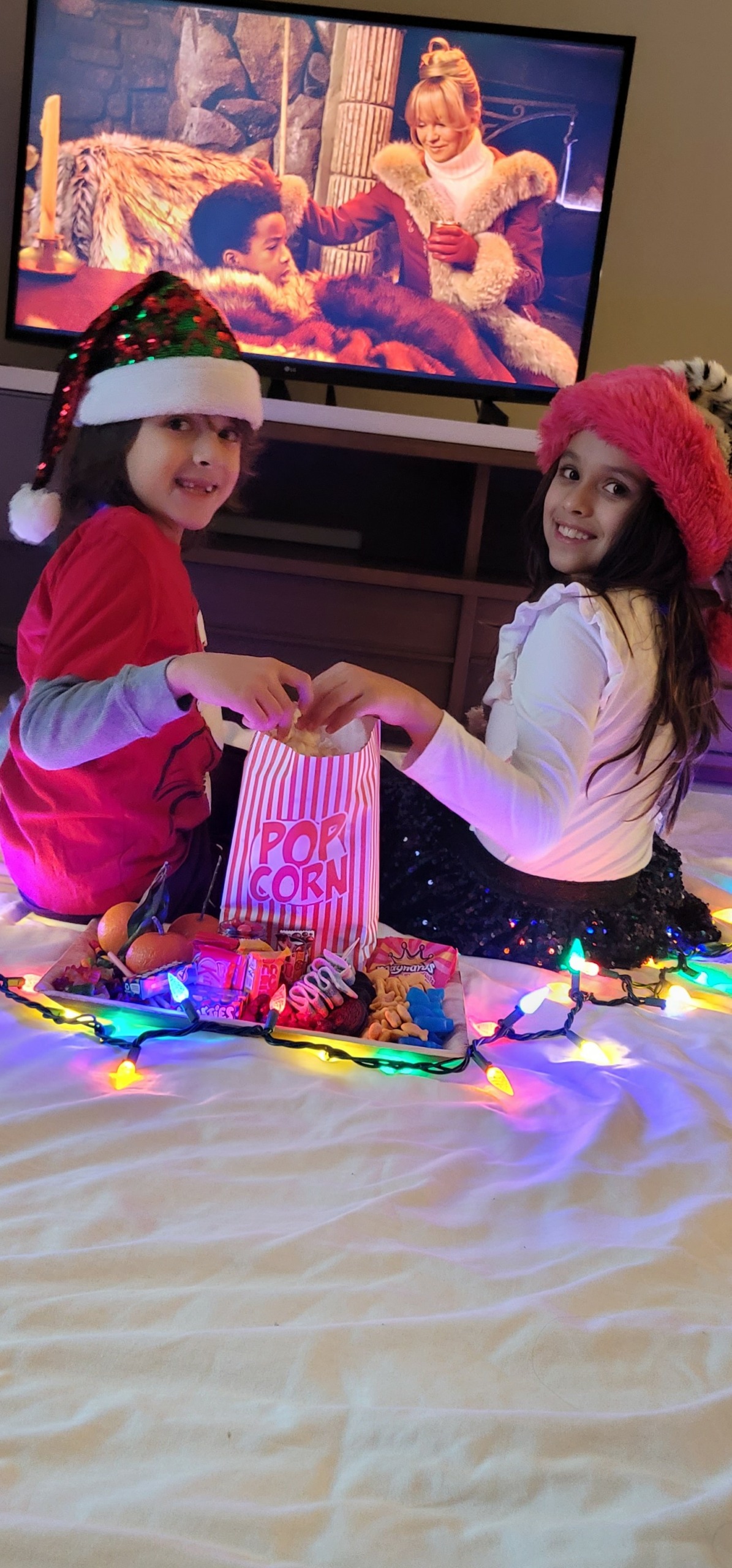 kids watching Christmas movie