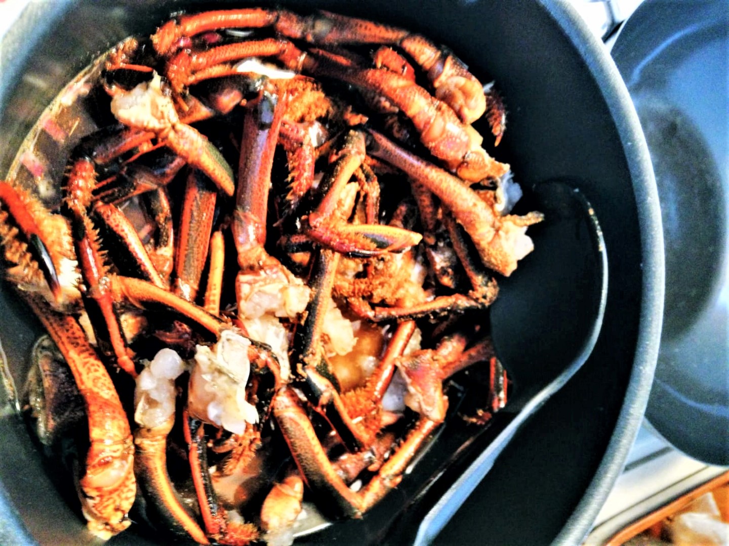 crab legs in a pot