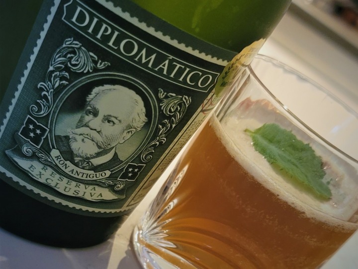Bottle of Diplomatico Reserva with airmail cocktail