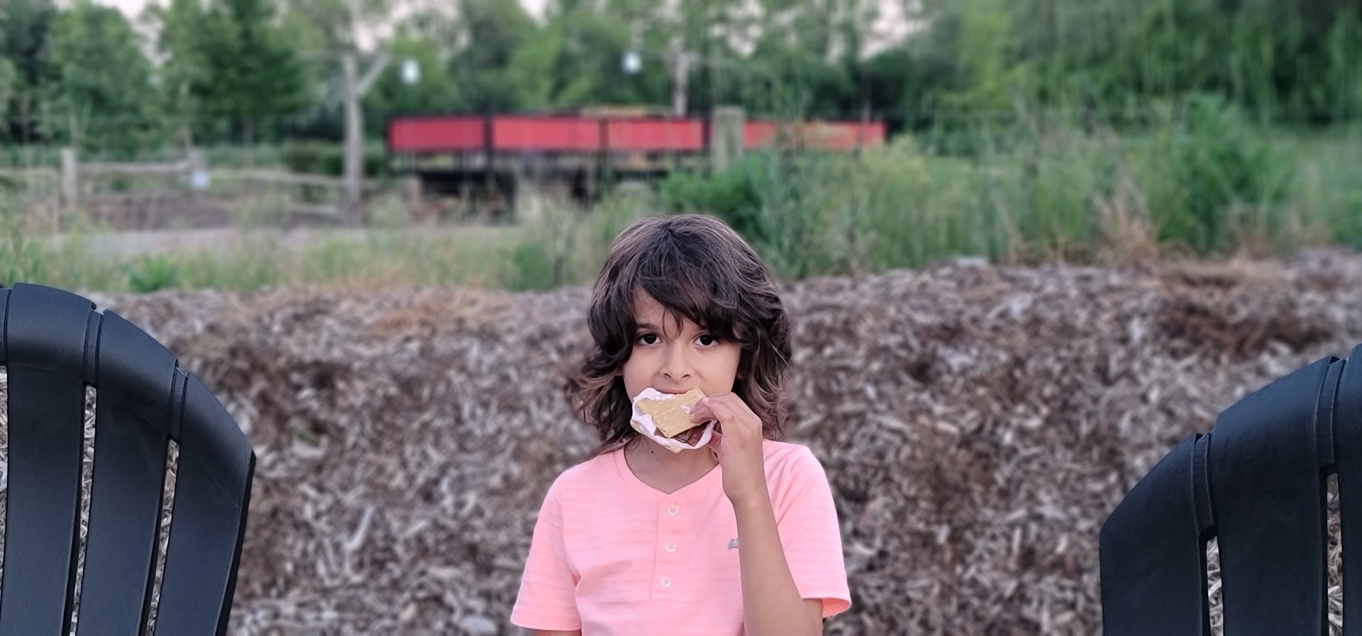 child eating s'more
