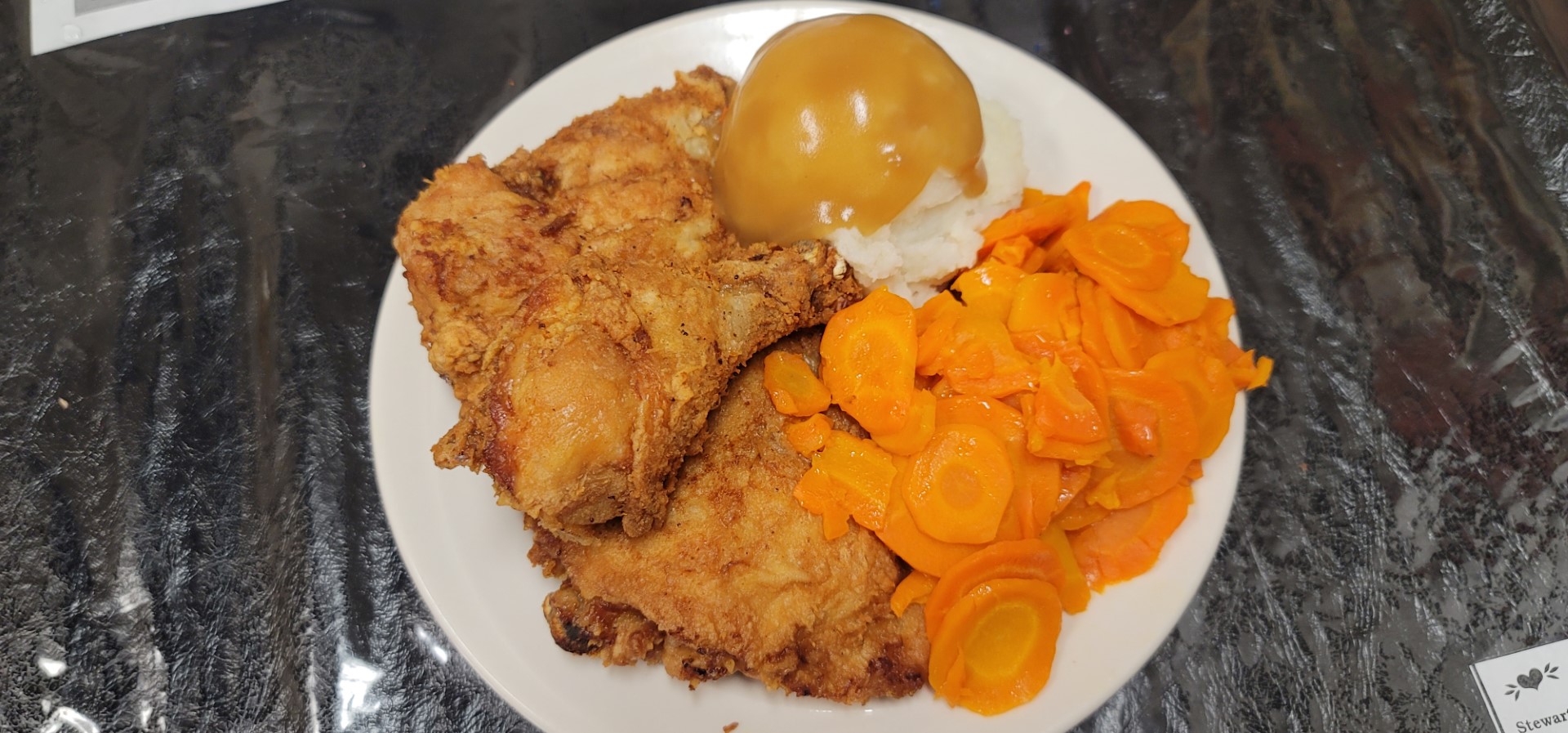 broasted chicken with mashed potatoes and gravy with carrots