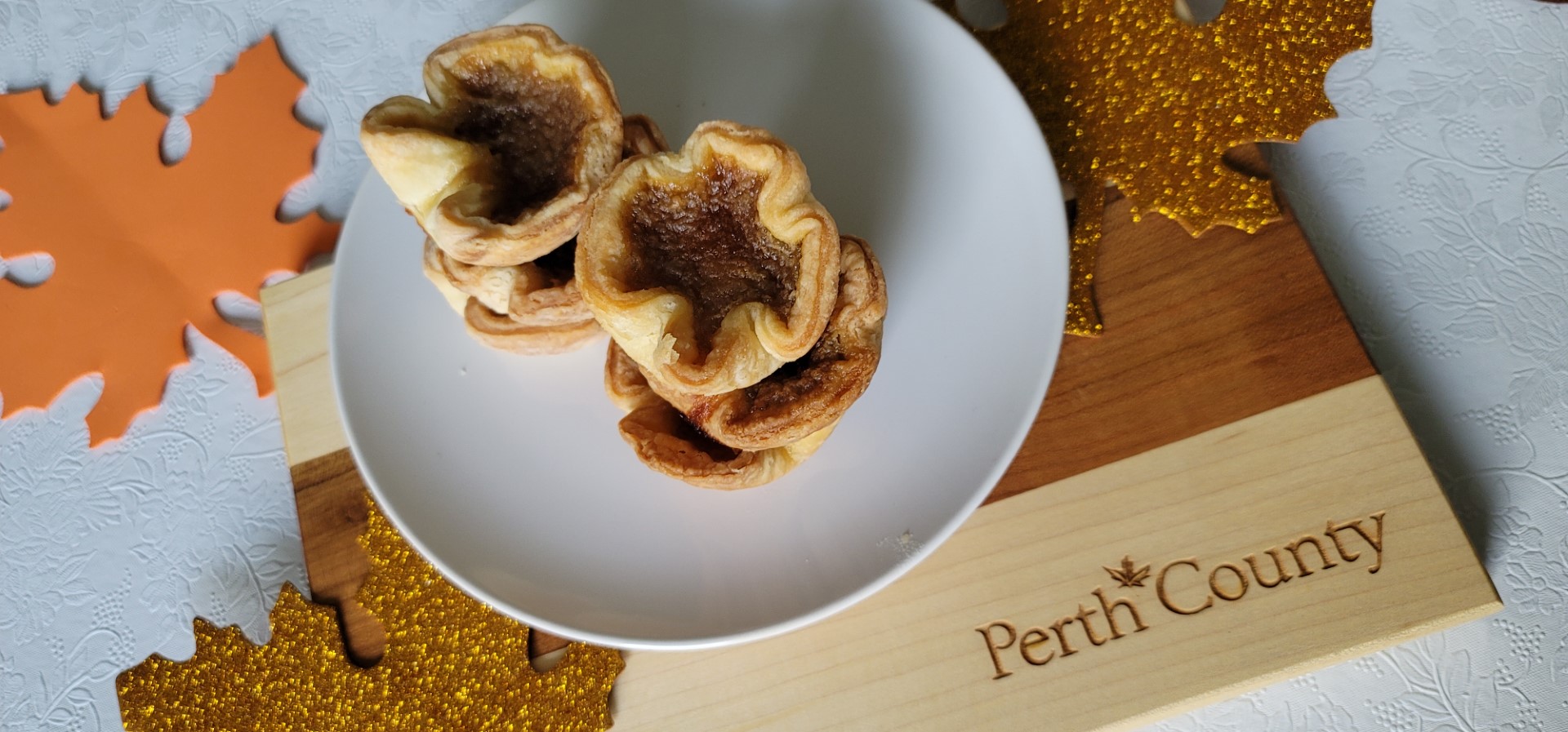 Butter tarts piled on a plate Perth County