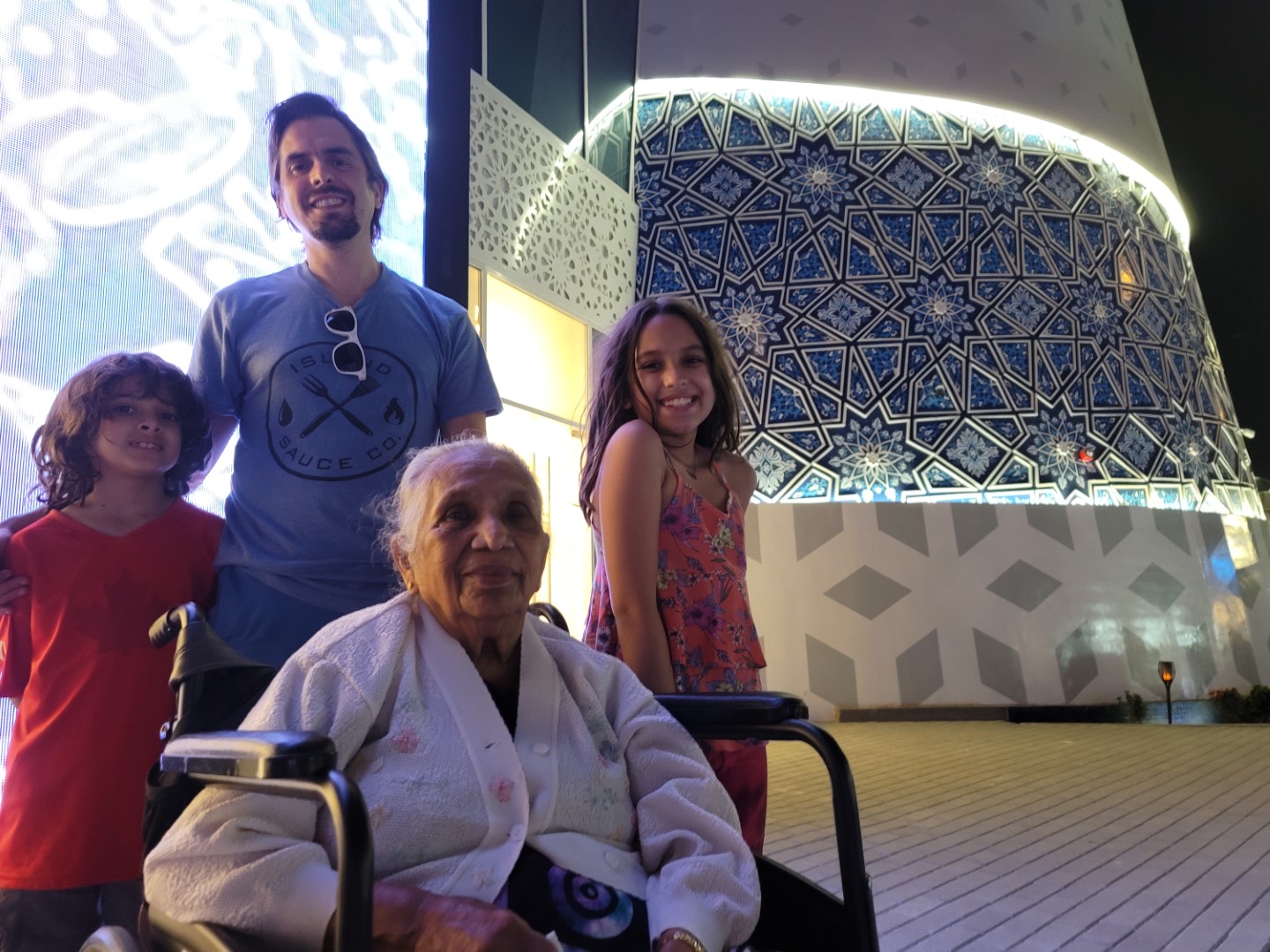 family at Dubai world expo with wheel chair