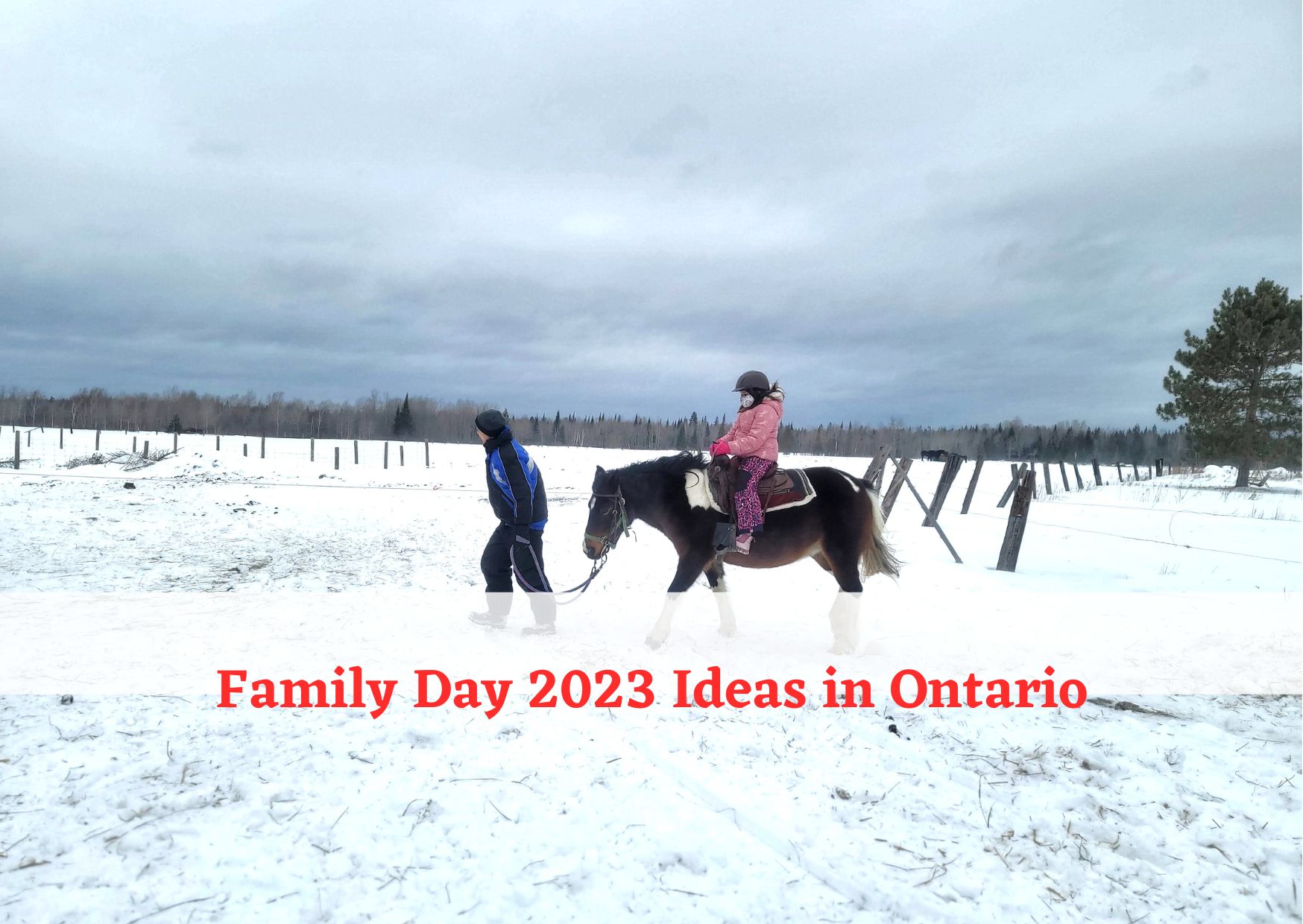 child riding a pony in snow