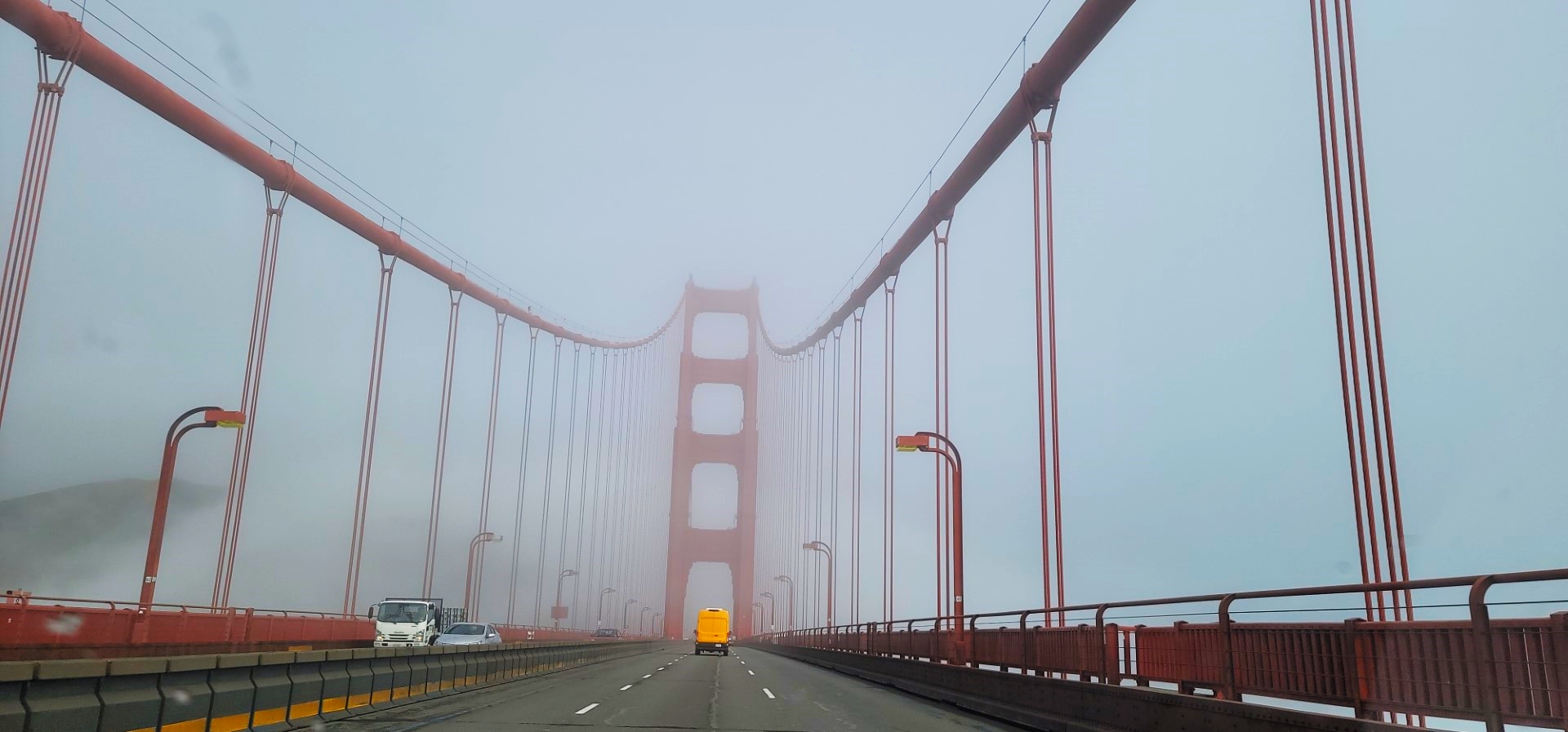 foggy drive on San Francisco Golden Gate Bridge