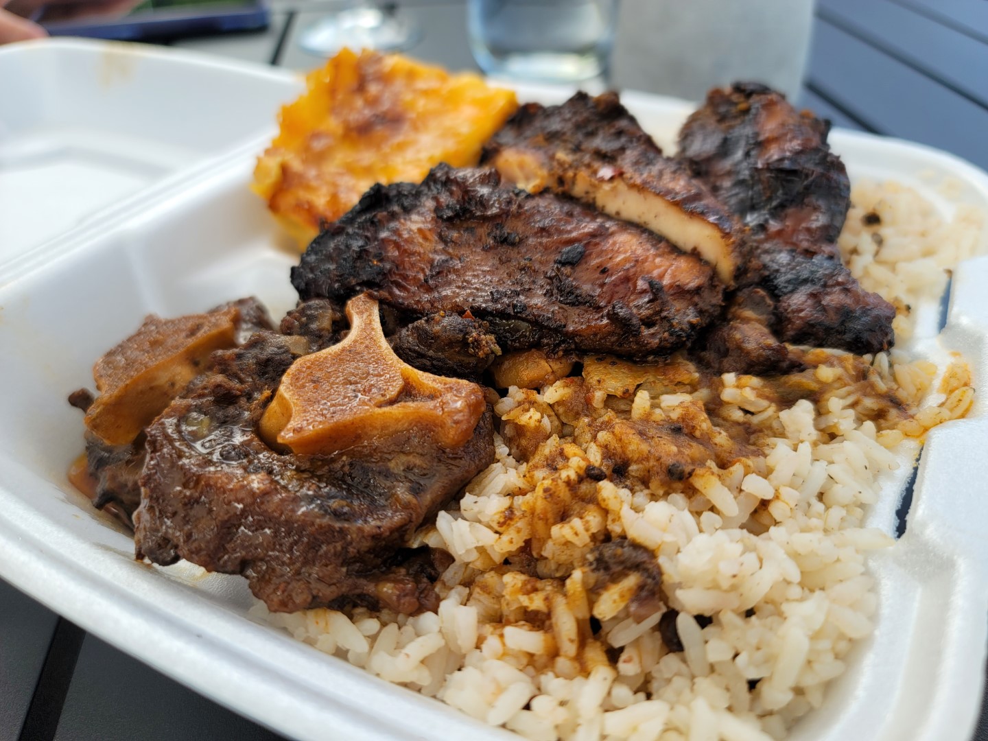 Oxtail Jerk Chicken and rice in Nova Scotia