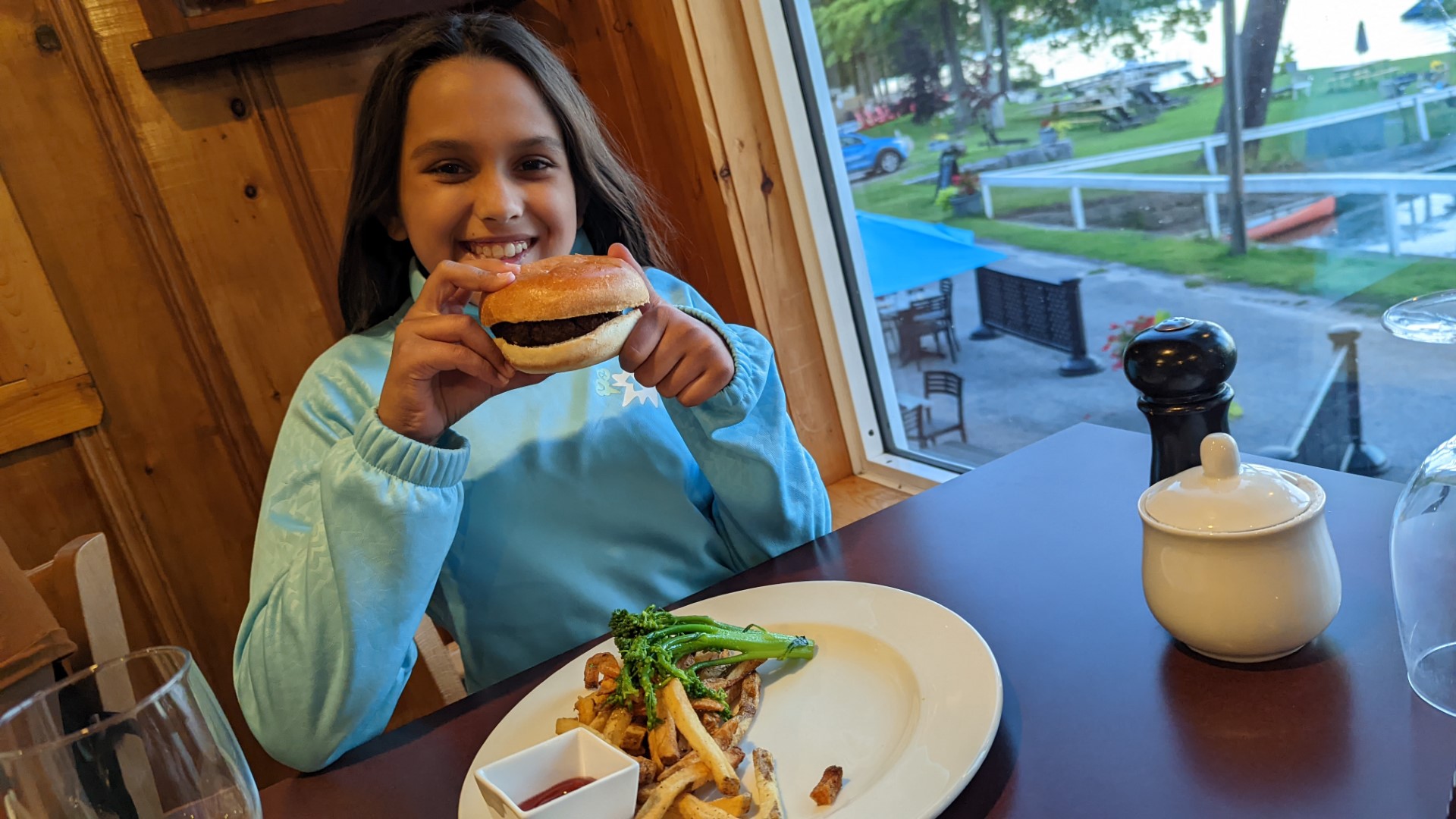child eating burger at Frederick's Beachwood resort