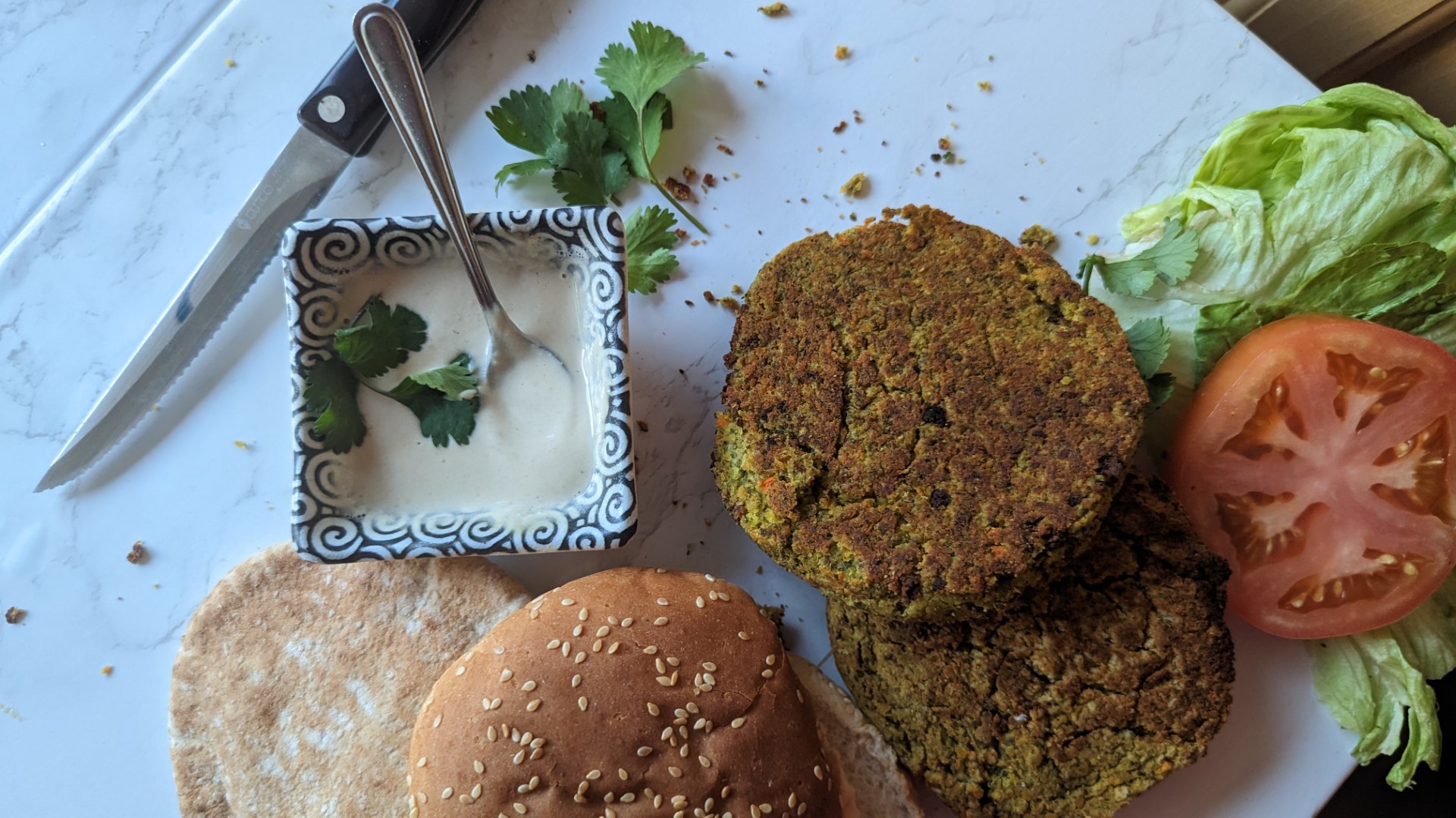 falafel burger being assembled