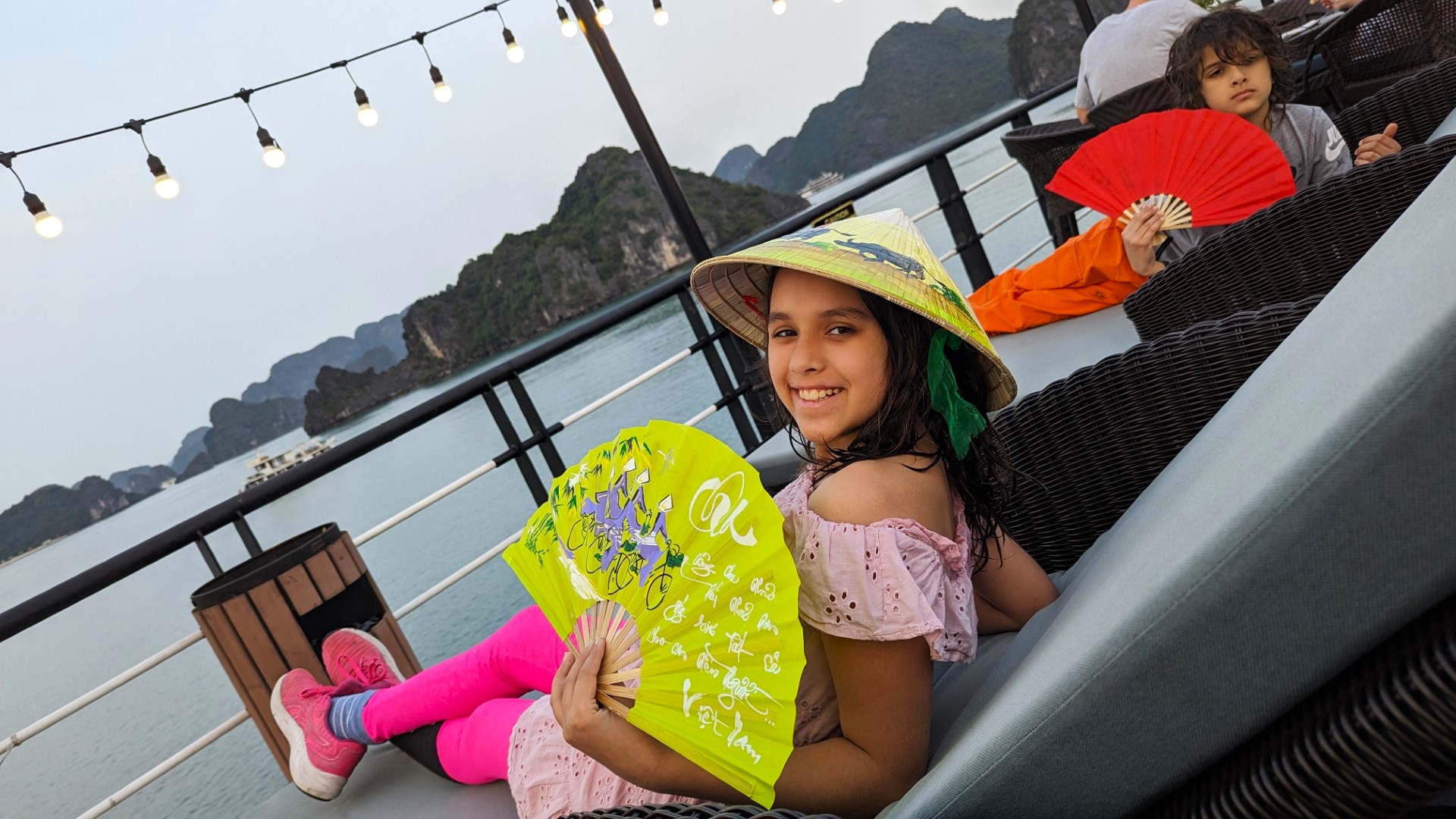 child on deck of cruise in Vietnam