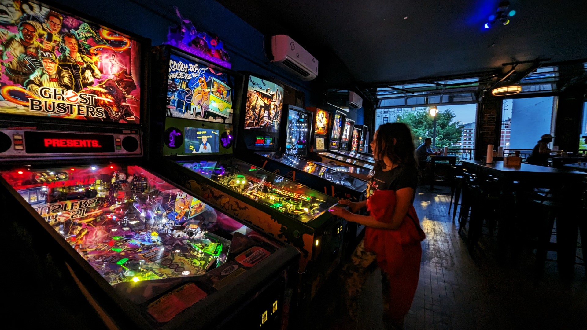 kids playing arcade games at Detroit bar