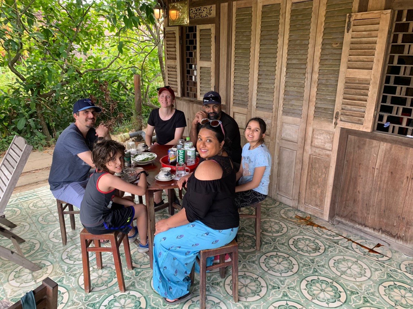 Yashy and family eating lunch in mekong delta