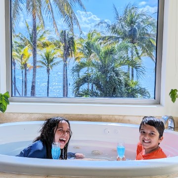 Kids in a tub at Sandos Caracol