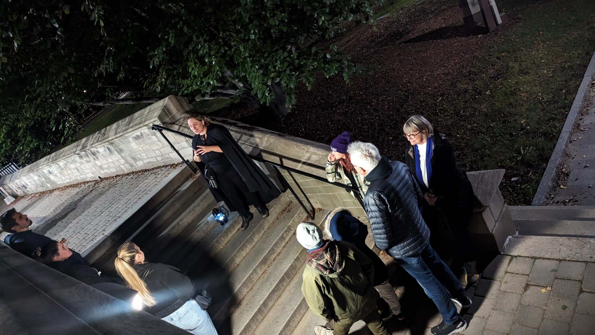 people gathered on a haunted walk tour in Toronto