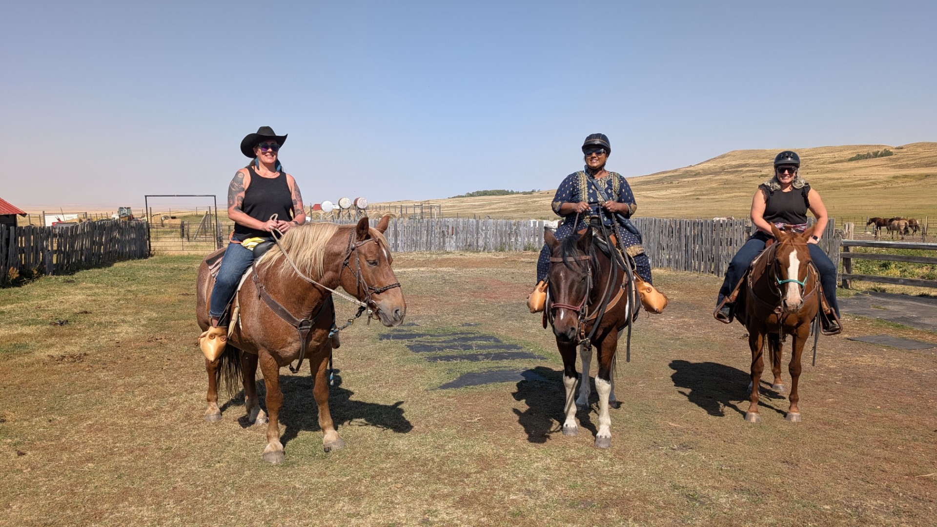 Cowgirls on horses in Reesor Ranch