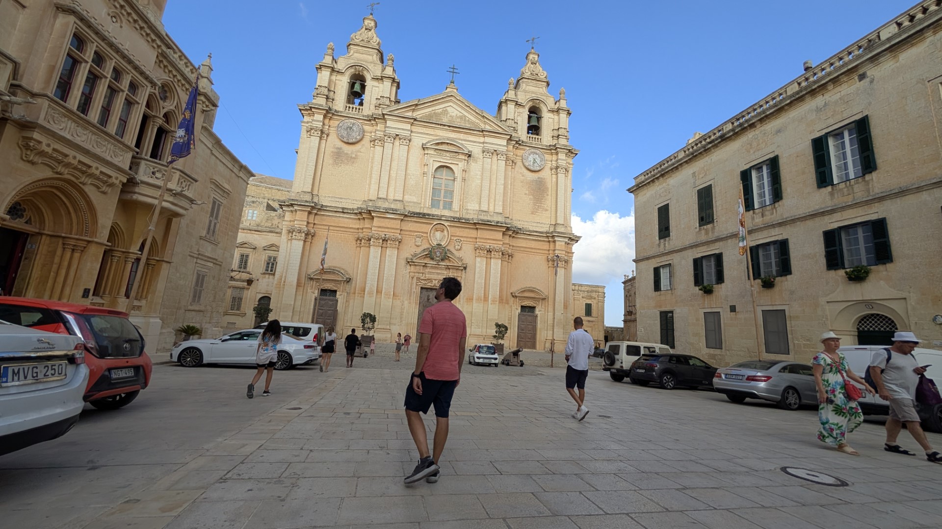 Mdina with man standing in the courtyard
