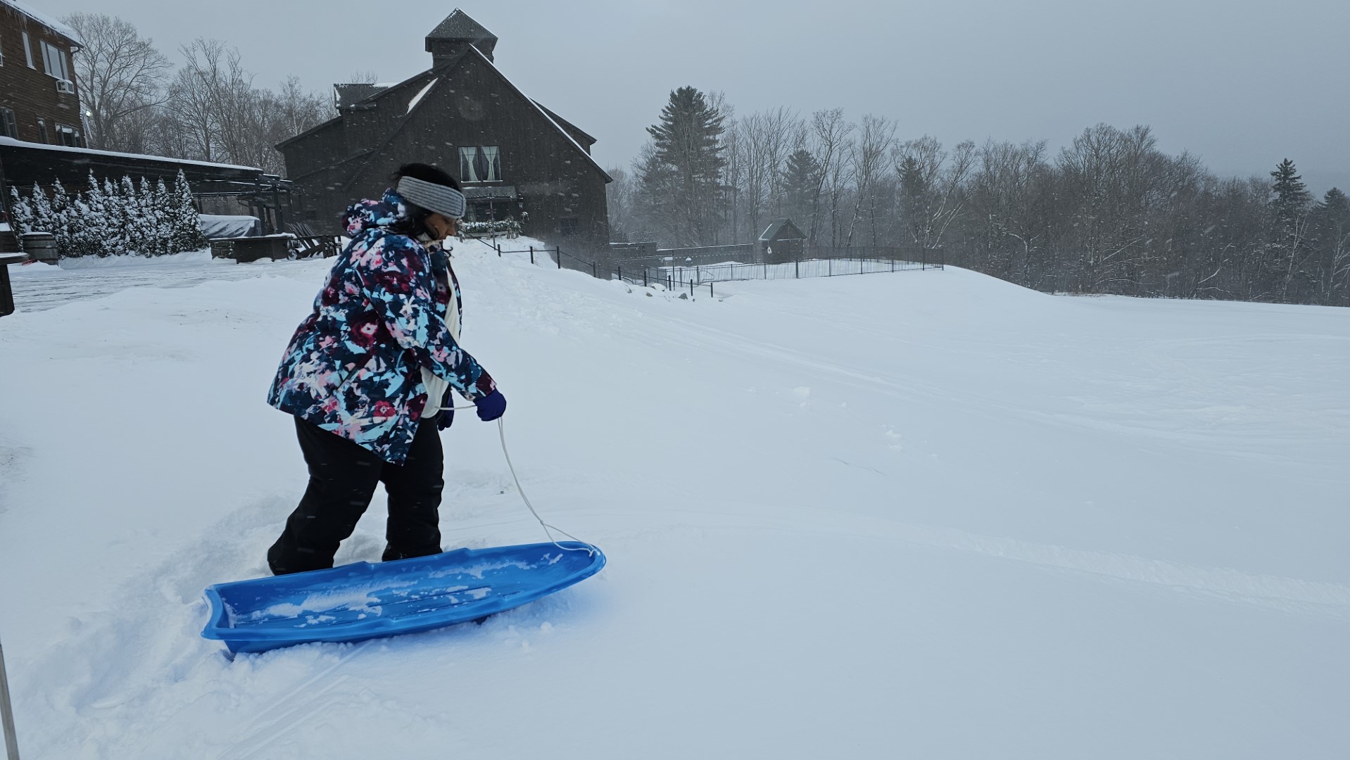 person sledding at Vermont Hotel