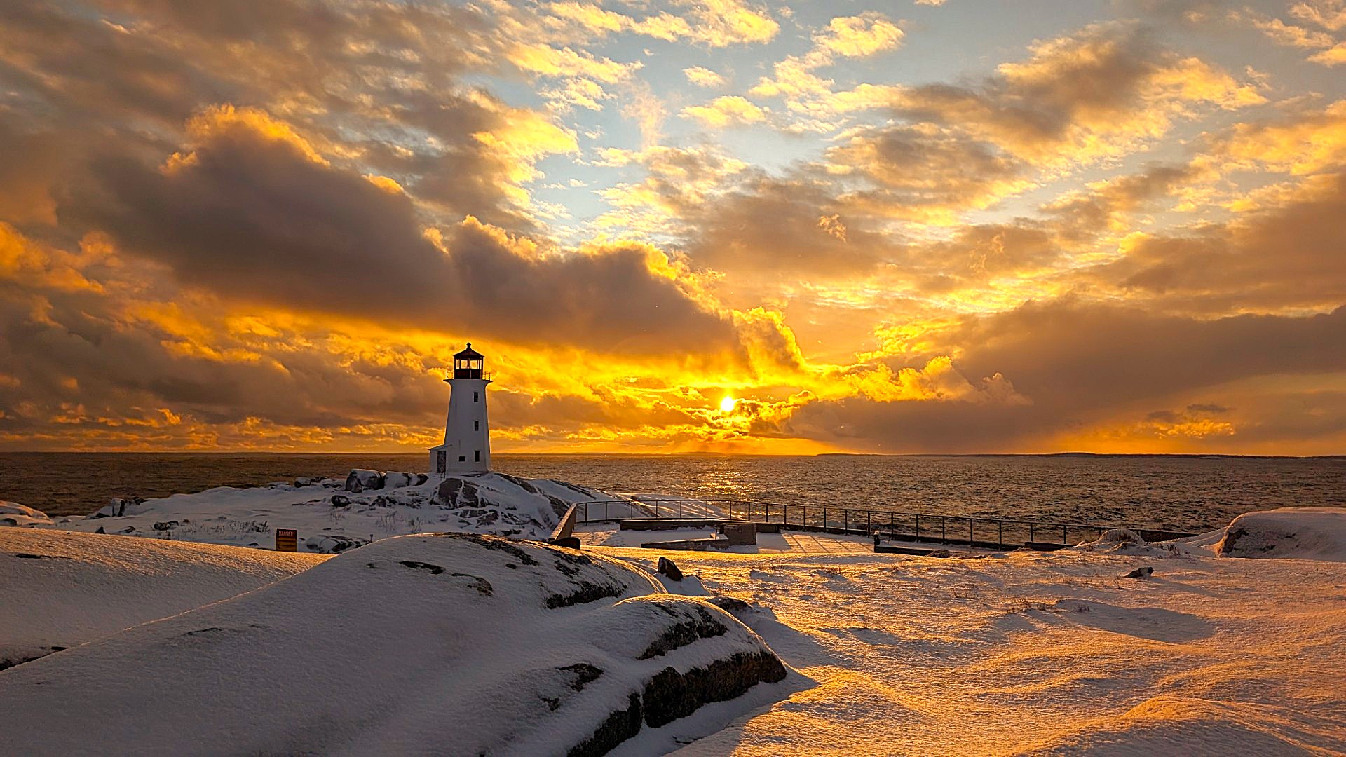 snowy Peggy's Cove sunset