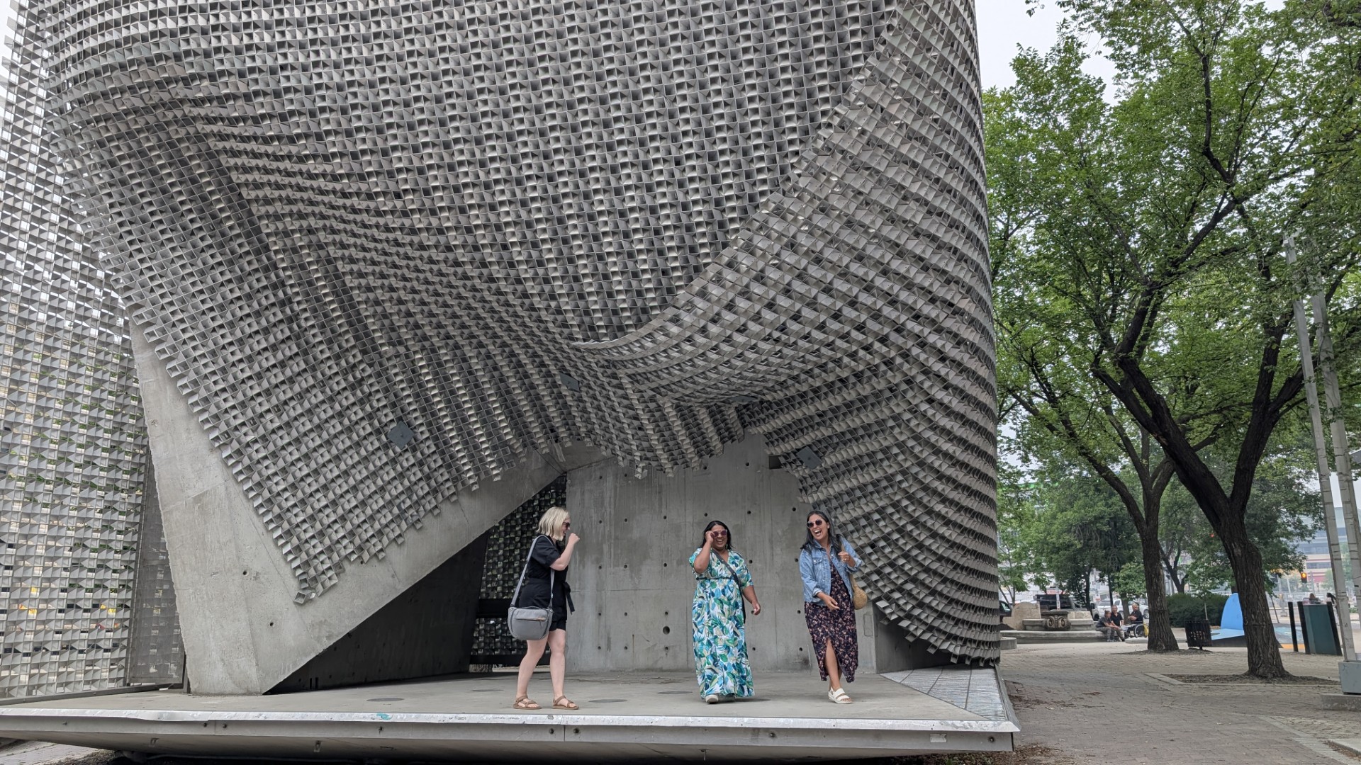 girlfriends in front of Winnipeg stage