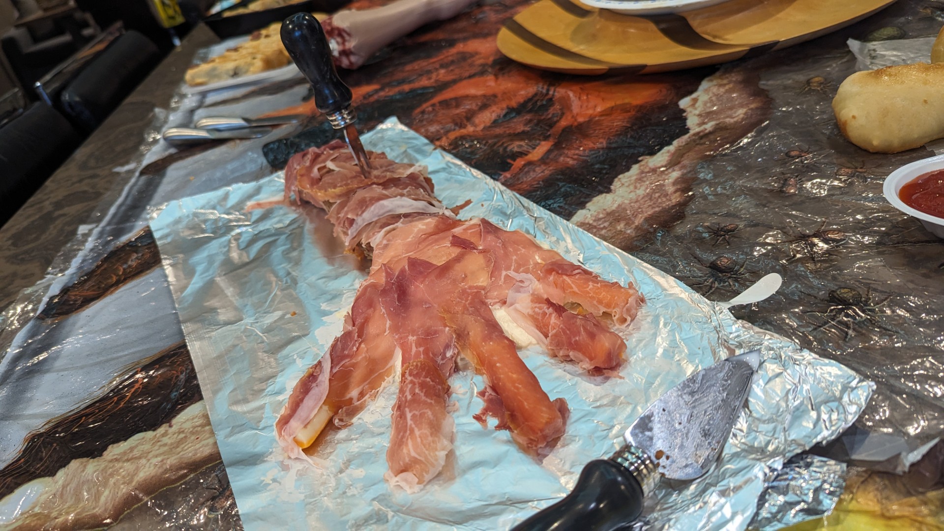 Pork loin and cheese hands with edible skin