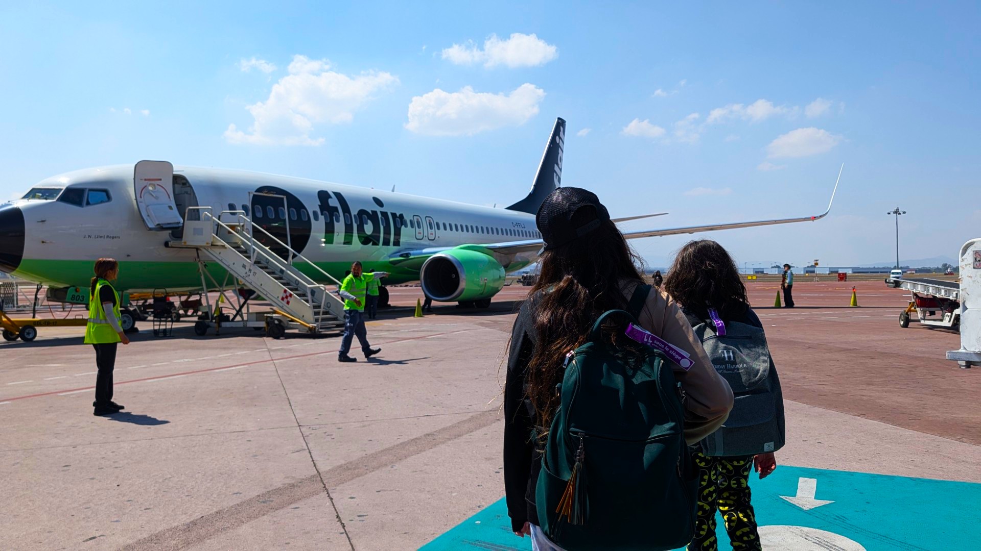 Children walking to Flair Airlines